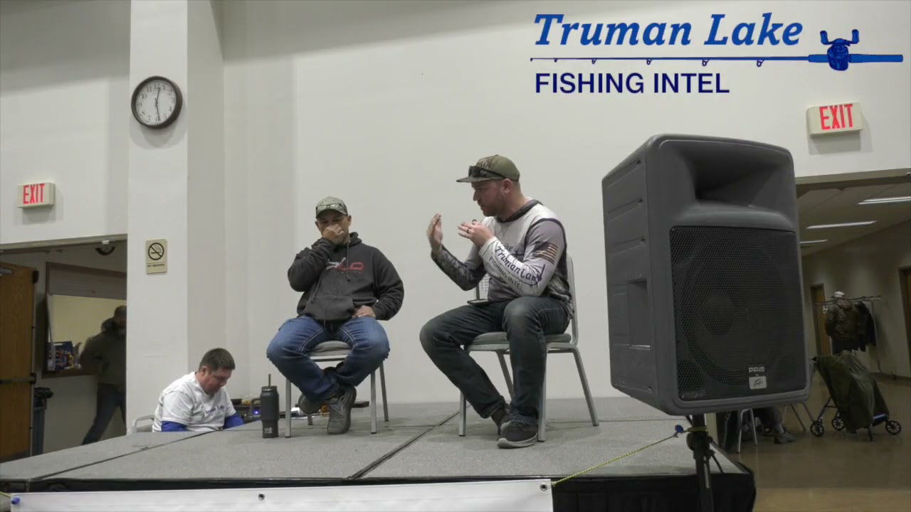 Everharts Outdoors Store Manager, Phillip McKinney, talks bass fishing with Tyler Mahoney at Truman Fishing Expo